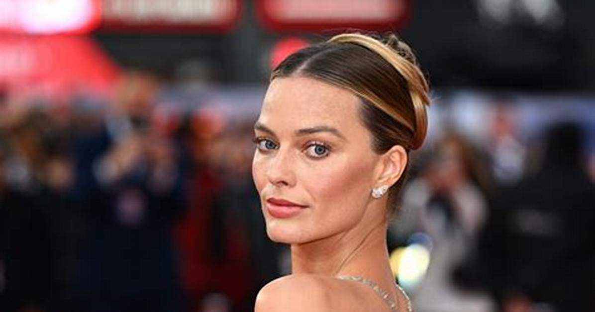 Unpacking the Look: Margot Robbie Stuns in 100 Carats of 'Nude Diamonds' and Sheer Corsetry